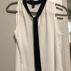 White blouse with black tie